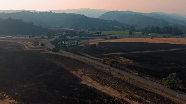 Vacaville, California, USA. 22 August 2020. Freeway traffic and burnt hills on the Interstate 80. LNU Lightning Complex Fire that ravaged the Napa, Sonoma, Lake and Solano counties.