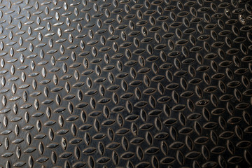 Metal floor plate with diamond steel pattern, metal sheet texture background.