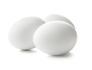 Raw chicken eggs on white background