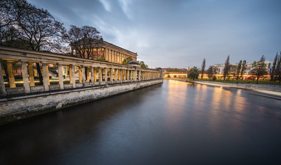 Scenic view of Twilight Alte Nationalgalerie by river against sky in Berlin Germany