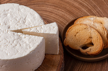 .Fresh round cheese, typical of the interior of Brazil in the state of Minas Gerais - Minas frescal.