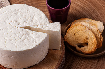 .Fresh round cheese, typical of the interior of Brazil in the state of Minas Gerais - Minas frescal.