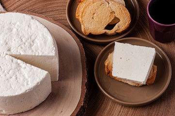 .Fresh round cheese, typical of the interior of Brazil in the state of Minas Gerais - Minas frescal.