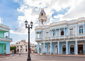 Cienfuegos, Cuba-October 13, 2016. Palace Ferrer, estate located at central square, park called Parque Jose Marti in historical centre of Cienfuegos south coast town with colonial-era buildings.