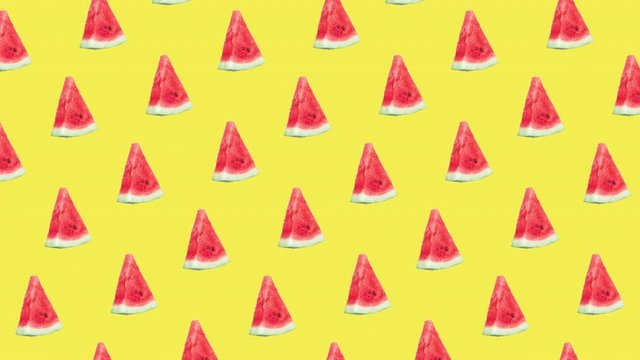 seamless pattern with many red ripe watermelon slices animated on a yellow background. realistic 3d food. advertising concept with copy space
