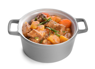 Pot with tasty beef stew on white background