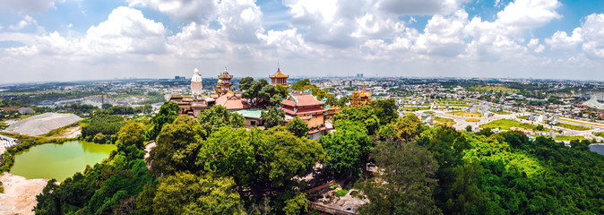 Aerial view of bodhisattva architecture and double sky dragon in Chau Thoi pagoda, Binh Duong...