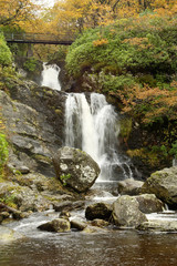 Fototapeta na wymiar waterfall at Inversnaid on Loch Lomond in autumn