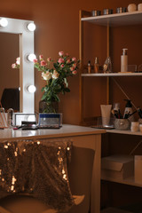 Stylish interior of modern dressing room at night