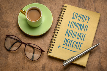 simplify, eliminate, automate, delegate productivity advice - motivational handwriting in a sketchbook with a cup of coffee, business and personal development concept