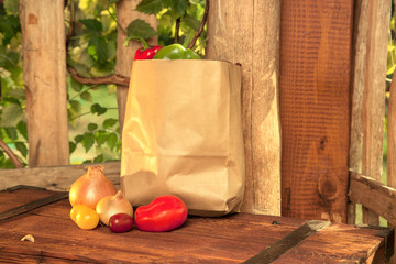 Fototapeta na wymiar Homegrown Vegetables in Paper Bag Mockup