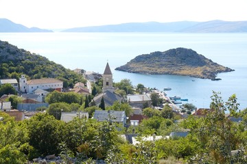 Fototapeta na wymiar Beautiful view of Sveti Juraj, Croatia. A small quiet port village on the Adriatic with crystal clear water.