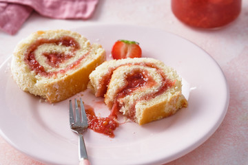 Strawberry jam swiss roll, selective focus.