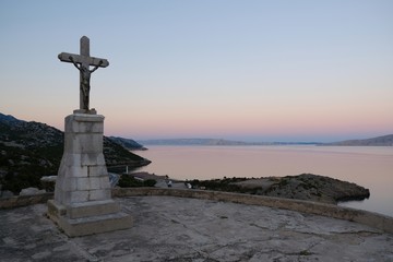 Hill with cross on top in Sveti Juraj, Croatia. There is beautiful view to Adriatic and village.