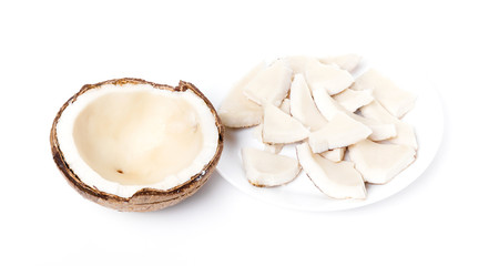 Coconut cut in half on white background