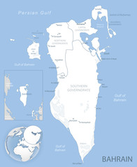 Blue-gray detailed map of Bahrain administrative divisions and location on the globe.