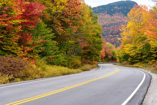 Stunning autumn colours along a winding mountain road. kancamagus highway, NH, USA.