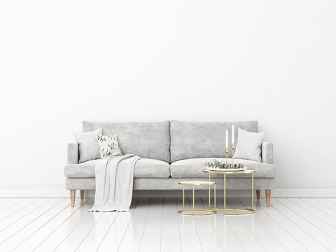 Living room interior mockup with grey sofa, pillows, plaid, coffee tables, candles and eucalyptus branches on white wall background. Trendy minimalist Christmas decoration. 3d rendering, illustration.