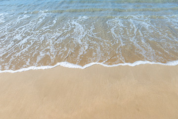 Clear sea water on fine sand beach, summer outdoor day light, nature concept background
