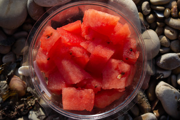 Extra healthy and colorful breakfast on a rocky beach