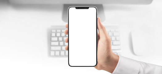 Hand holding smartphone device