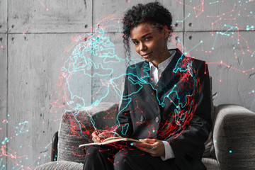 Businesswoman typing on laptop work in modern office on new project. World map drawing hologram. Double exposure. Concept of success.