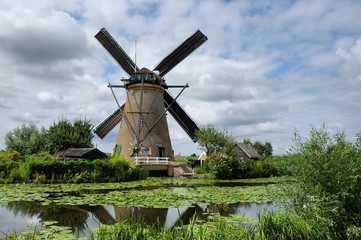 Naklejka premium Windmills at Kinderdijk, South Holland on a summer's day