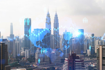 Fototapeta na wymiar Social media icons hologram over panorama city view of Kuala Lumpur, Malaysia, Asia. The concept of people networking and connections. Double exposure.