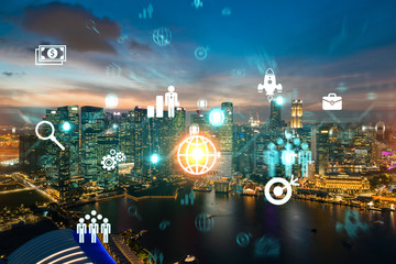 Hologram of Research and Development glowing icons. Sunset panoramic city view of Singapore. Concept of innovative technologies to create new services and products in Asia.