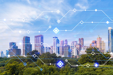 Technology hologram over panorama city view of Bangkok. The largest tech hub in Asia. The concept of developing coding and high-tech science. Double exposure.