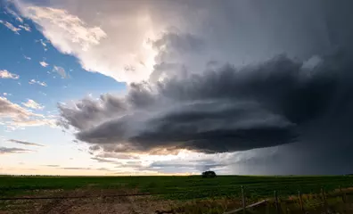 Fotobehang Summer thunderstorm in the prairies © Jillian