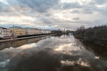 Fototapeta na wymiar Russian river cityscape at autumn time