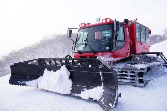 FEB 18, 2018 IWATE JAPAN : Red snowcat in winter mountains A red snow tucker covered with snow in Iwate Japan.