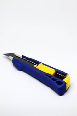 Cutter knife isolated on white background.