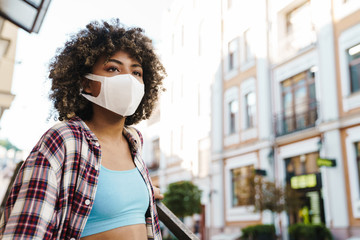 Portrait of beautiful woman walking on the street