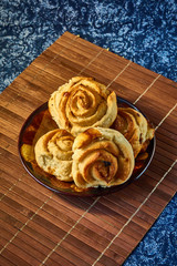 Fresh sweet homemade buns, homemade baked goods.