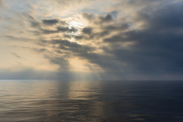 Fototapeta na wymiar Seascape in cloudy and foggy weather