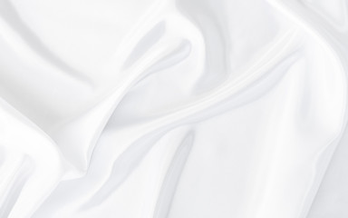 Obraz premium Biała szara satynowa tekstura, która jest białym srebrnym jedwabnym tłem tkaniny z pięknym miękkim wzorem rozmycia naturalnego.