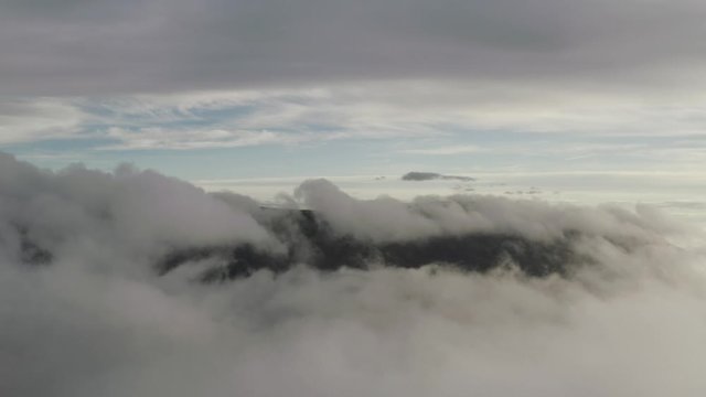 Spectacular aerial view with layers of cloud in the mountains