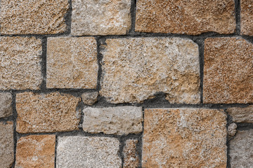 Irregular and rustic brick wall/path texture background.