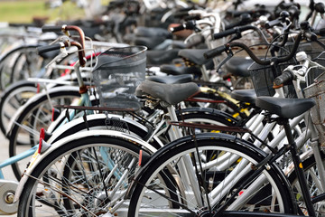 Many bicycles at parking space 
