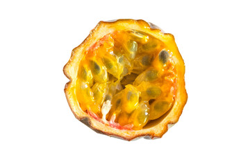 Slice of passion fruit cut out on white background.