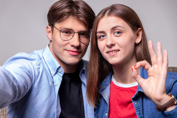 Happy young people communicate with relatives and friends via webcam. The concept of video...