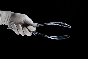 plastic transparent spoon for the kitchen in the hands