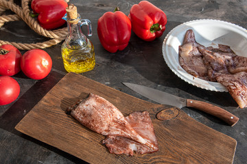 Cooking squid dishes with vegetables. Kalmar, butter, tomatoes and red sweet pepper © olga bezhskaia