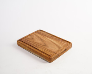 trays made of used wood, commonly used to serve food and drinks in restaurants. a tray made from recycled and polished wood waste so that it becomes an elegant and unique wooden tray.