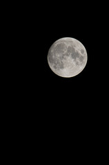 Naklejka premium A full moon in black and wight 