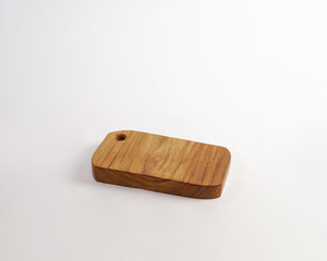 a cutting board made of used wood, commonly used for chopping bones, cutting meat.