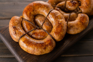 fried sausage Chicken on a wooden background