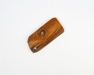 a cutting board made of used wood, commonly used for chopping bones, cutting meat.